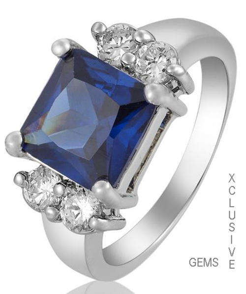 * R35 POSTAGE* 18K WHITE GOLD PLATED SIMULATED SAPPHIRE LADIES RING