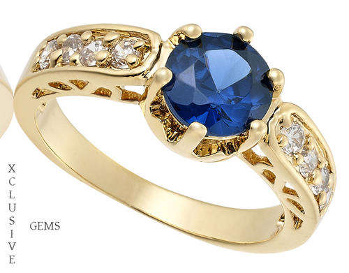 * R35 POSTAGE* 18K YELLOW GOLD PLATED SIMULATED SAPPHIRE LADIES RING