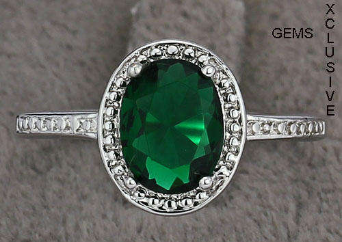 ** DAZZLING 18K WHITE GOLD PLATED SIMULATED EMERALD LADIES RING