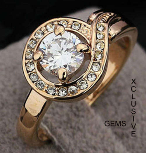 * R35 POSTAGE* ROSE GOLD PLATED SIMULATED DIAMOND LADIES RING