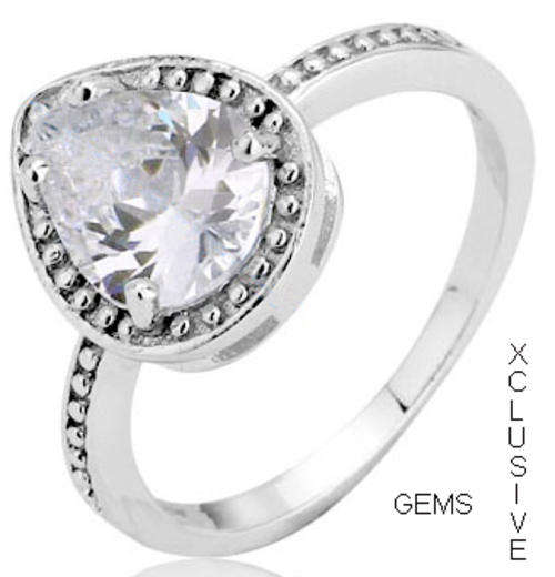 * R35 POSTAGE* 18K WHITE GOLD PLATED SIMULATED DIAMOND LADIES RING