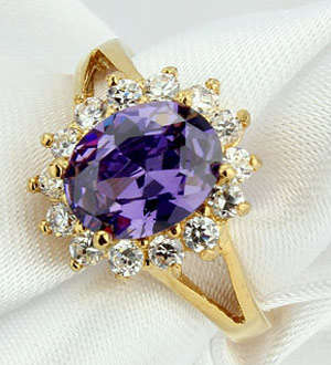 * R35 POSTAGE* ROSE GOLD PLATED SIMULATED AMETHYST LADIES RING