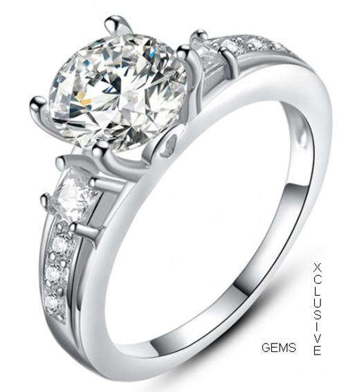 * R35 POSTAGE* 18K WHITE GOLD PLATED SIMULATED DIAMOND LADIES RING