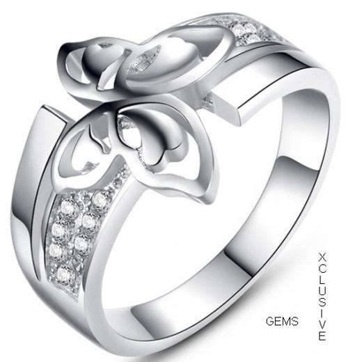 * R35 POSTAGE* 18K WHITE GOLD PLATED SIMULATED DIAMOND LADIES RING