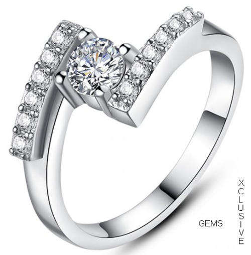 * R35 POSTAGE* 18K WHITE GOLD PLATED SIMULATED DIAMOND LADIES RING
