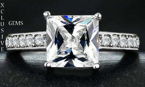 * R35 POSTAGE* 18K WHITE GOLD PLATED SIMULATED DIAMOND LADIES RING