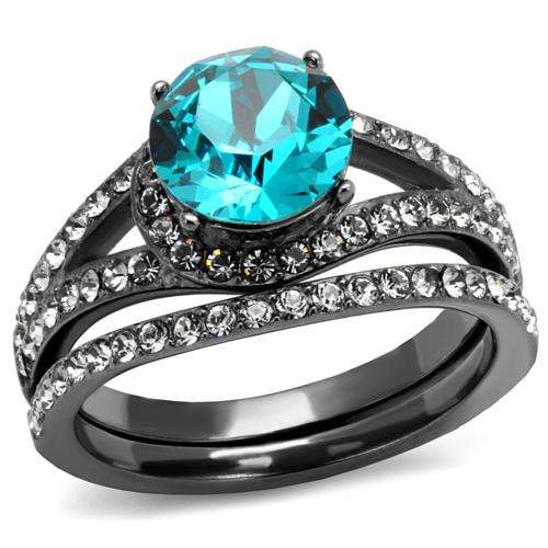 BEAUTIFUL SIMULATED BLUE TOPAZ GUN METAL STAINLESS STEEL LADIES WEDDING RING SET