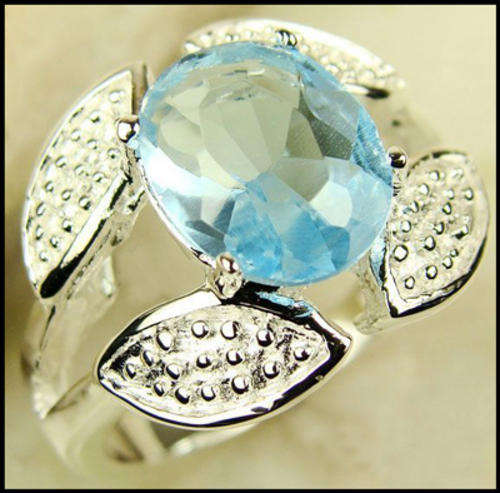 STERLING SILVER BLUE TOPAZ CZ RING