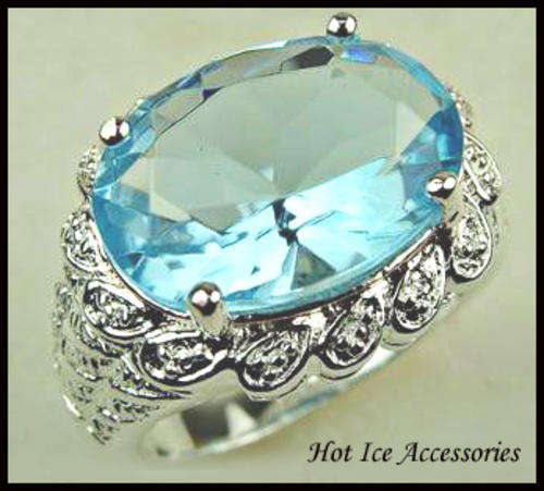 **INTERNATIONAL SHIPPING** STERLING SILVER HALLMARKED SIMULATED BLUE TOPAZ RING