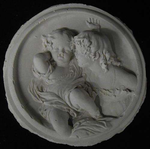 Antique style plaque of girl and baby