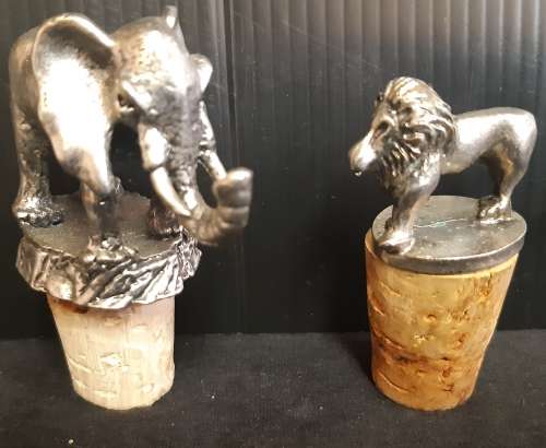TWO VINTAGE BOTTLE STOPPERS, ONE BID FOR BOTH