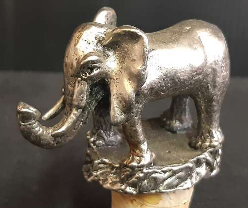 TWO VINTAGE BOTTLE STOPPERS, ONE BID FOR BOTH