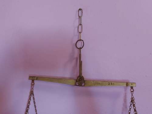 ANTIQUE BRASS AND COPPER HANGING SCALE