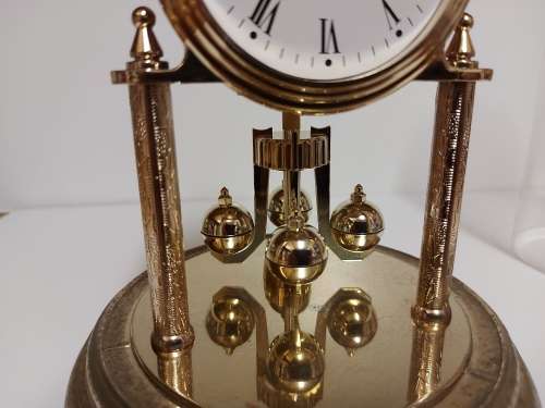 DOMED VIP HAINBELL QUARTZ CLOCK, BATTERY OPERATED AND NOT TESTED