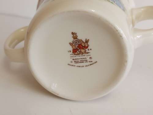 AWESOME ROYAL DOULTON BUNNYKINS TWIN HANDLE MUG WITH BRIGHT AND VIVID IMAGES