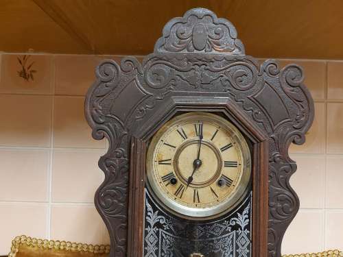 VINTAGE ANSONIA MANTLE CLOCK WITH KEY AND PENDULUM , MADE IN THE USA AND IN A WORKING CONDITION