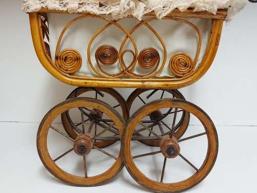 AWESOME! STUNNING VINTAGE ORNATE DESIGN CANE AND STEEL DOLL`S PRAM WITH A LACE BONNET