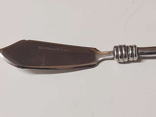 CARROL BOYES FUNCTIONAL ART: VINTAGE PEWTER AND STAINLESS STEEL SPREADER