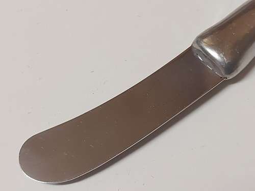 CARROL BOYES FUNCTIONAL ART: VINTAGE PEWTER AND STAINLESS STEEL SPREADER