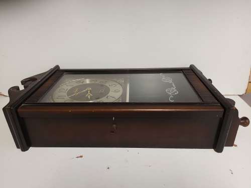 VINTAGE RHYTHM 30 DAY WALL CLOCK IN A WOODEN CASING, WITH KEY AND PENDULUM AND WORKING