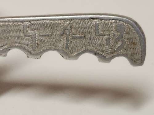 WORLD WAR II ITALIAN P.O.W SILVER METAL TRENCH ART, COMPRISING A SMALL DAGGER AND 5 SERVIETTE RINGS
