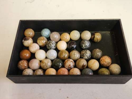 COLLECTION OF 37 HIGHLY POLISHED SEMI-PRECIOUS GEMSTONE SPHERES