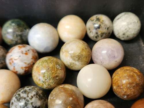 COLLECTION OF 37 HIGHLY POLISHED SEMI-PRECIOUS GEMSTONE SPHERES