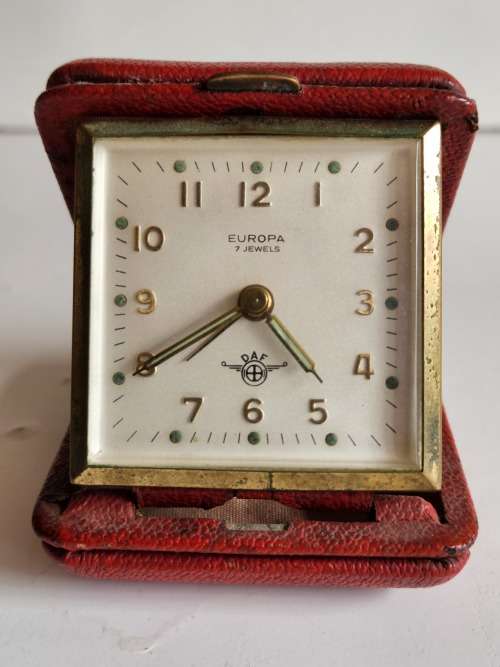 VINTAGE GERMAN BRASS EUROPA 7 JEWELS RED CASED TRAVEL ALARM CLOCK, WORKING