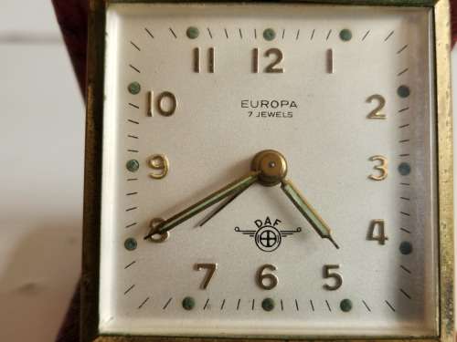 VINTAGE GERMAN BRASS EUROPA 7 JEWELS RED CASED TRAVEL ALARM CLOCK, WORKING