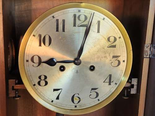 ANTIQUE GUSTAV BECKER WALL CLOCK IN A WORKING CONDITION