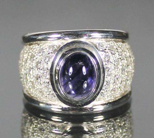 Spectacular sterling silver and iolite ring with cz. Size P 1/2. No reserve!!