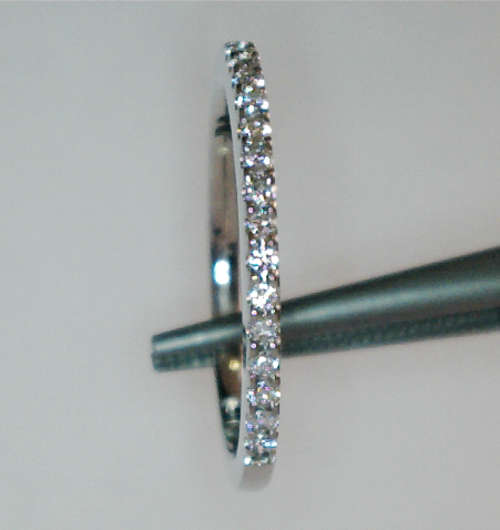 New! 9ct White gold and diamond band, total (0,15ct diamonds) Size L, USA size 6