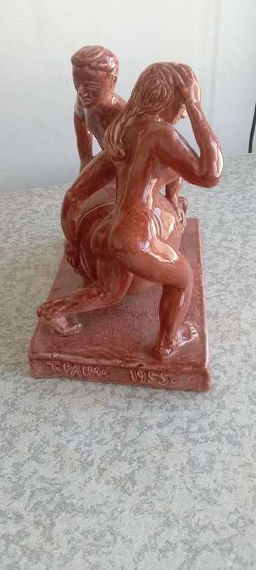 Stunning Solid Sculpture of Woman and Guy with Ball