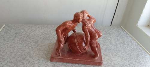 Stunning Solid Sculpture of Woman and Guy with Ball
