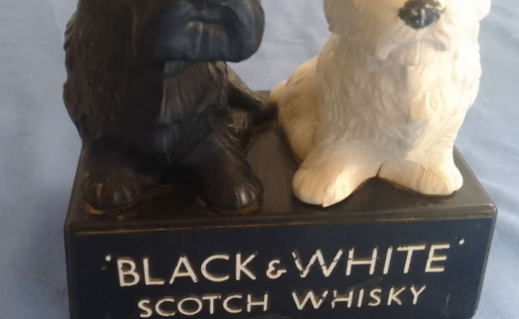 Black and White Scotch whiskey display - Plastic
