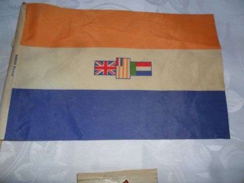 A SET OF  OLD SOUTH AFRICAN LAPEL PINS PLUS HAND HELD FLAG -SMALL