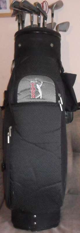 A SET OF SPALDING PARADOX GOLF CLUBS PLUS PGS TOUR GOLF BAG