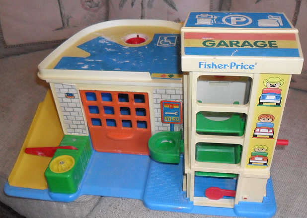 FISHER PRICE VINTAGE GARAGE WITH SOME DAMAGE