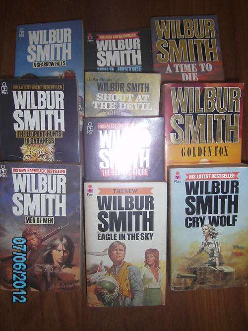 11 WILBUR SMITH PAPERBACKS  (good condition)