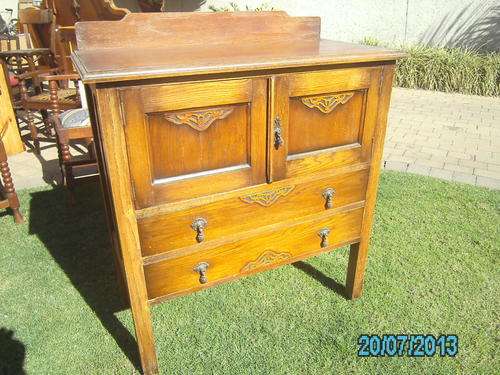 VINTAGE OAK CABINET, TWO DRAWS, with nice carving