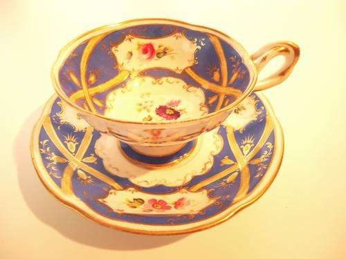 A VERY RARE H & R DANIEL HAND PAINTED TEA DUO