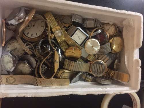 Box full of broken mechanical old watches