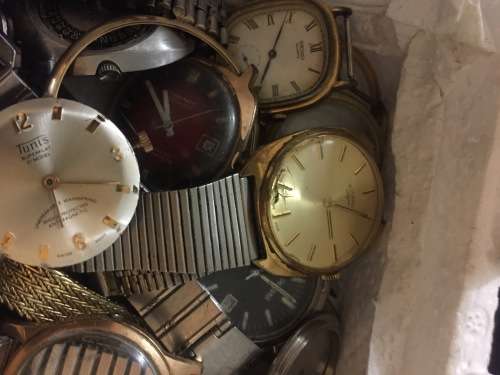 Box full of broken mechanical old watches
