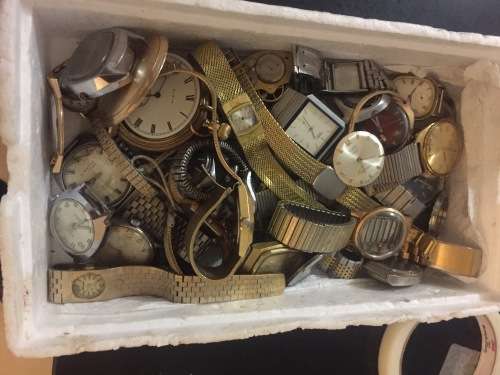 Box full of broken mechanical old watches
