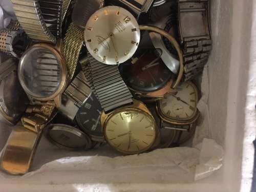 Box full of broken mechanical old watches