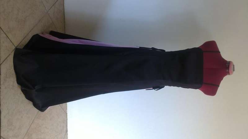 Stunning black formal gown with pink side inserts
