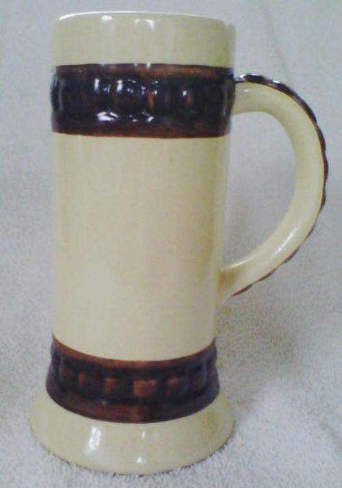 Tall ceramic beer mug