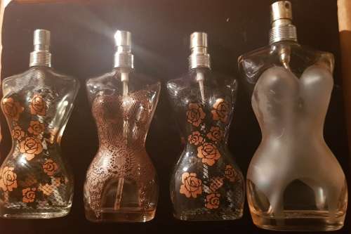 Set of 4 Collectable Jean Paul Gaultier Empty Glass Perfume Bottles