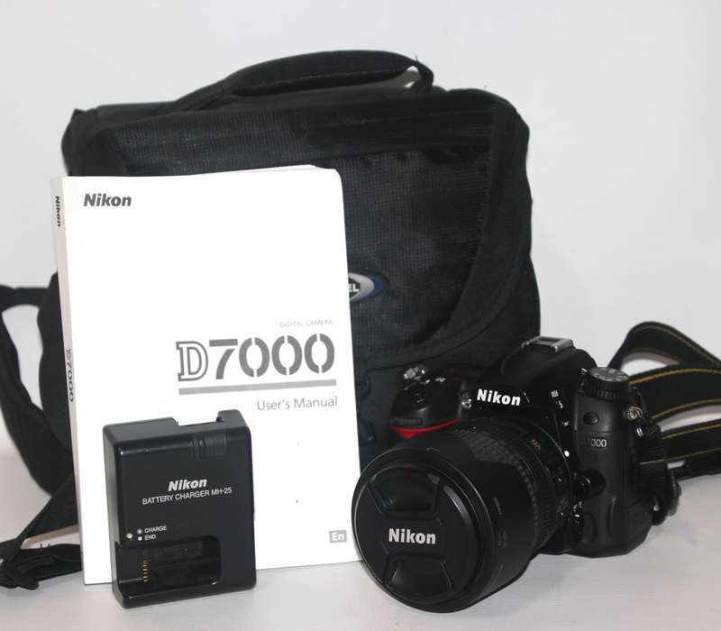 NIKON D7000, 16MP DSRL + 18-105MM VR LENS IN EXCELLENT CONDITION )LOW SHUTTER COUNT OF 11650