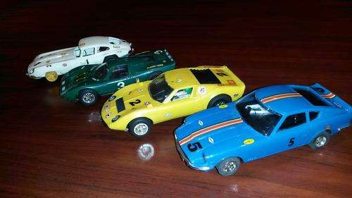 BUNDLE 4 vintage scalextric cars (datsun, lamborghini, jaguar, ford) & 2 transformers